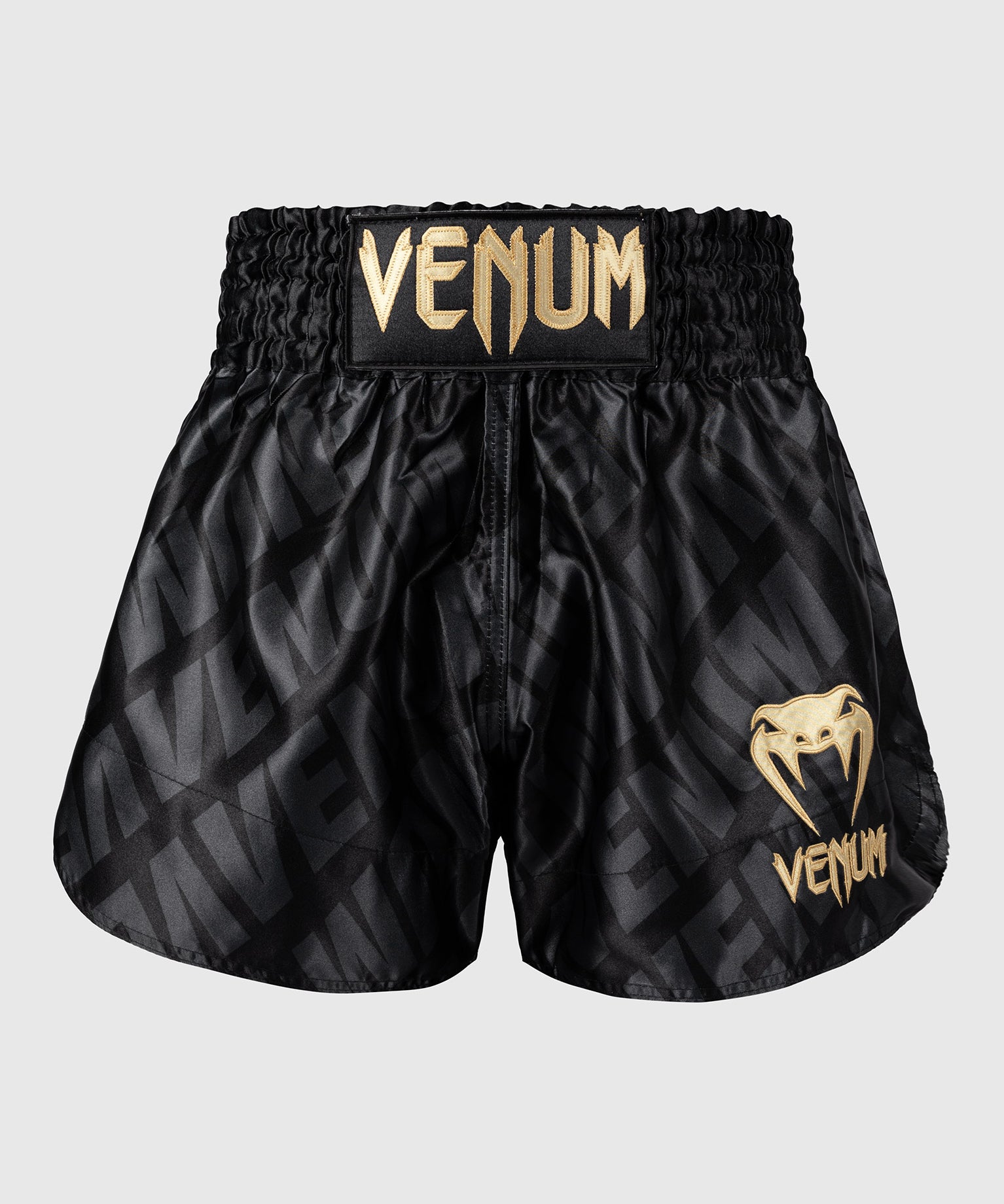 VENUM CONTENDER XT MUAY THAI SHORTS – ZWART/GOUD
