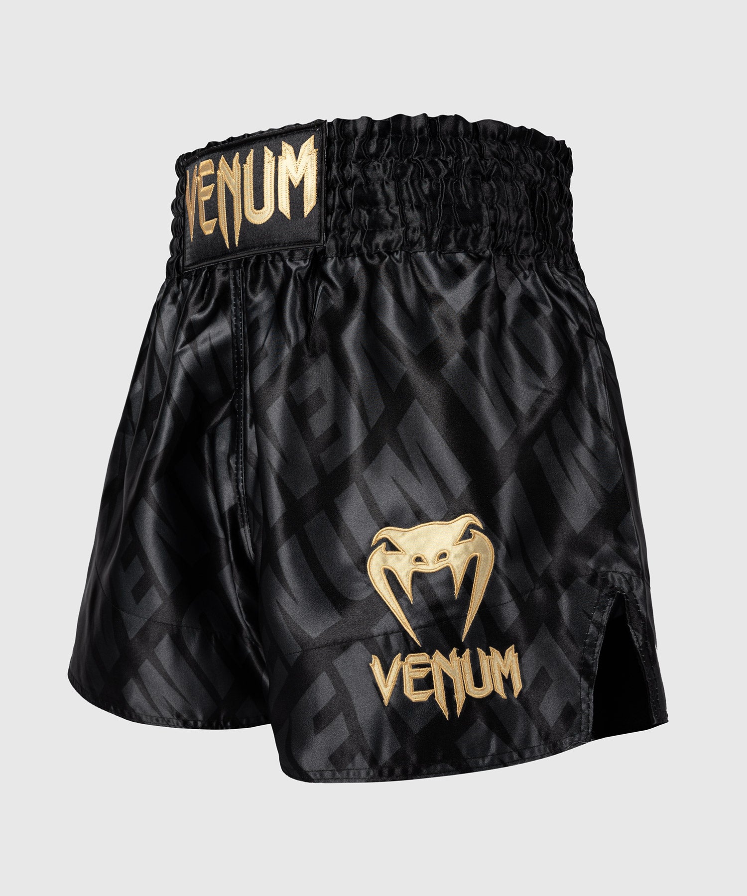 VENUM CONTENDER XT MUAY THAI SHORTS – ZWART/GOUD
